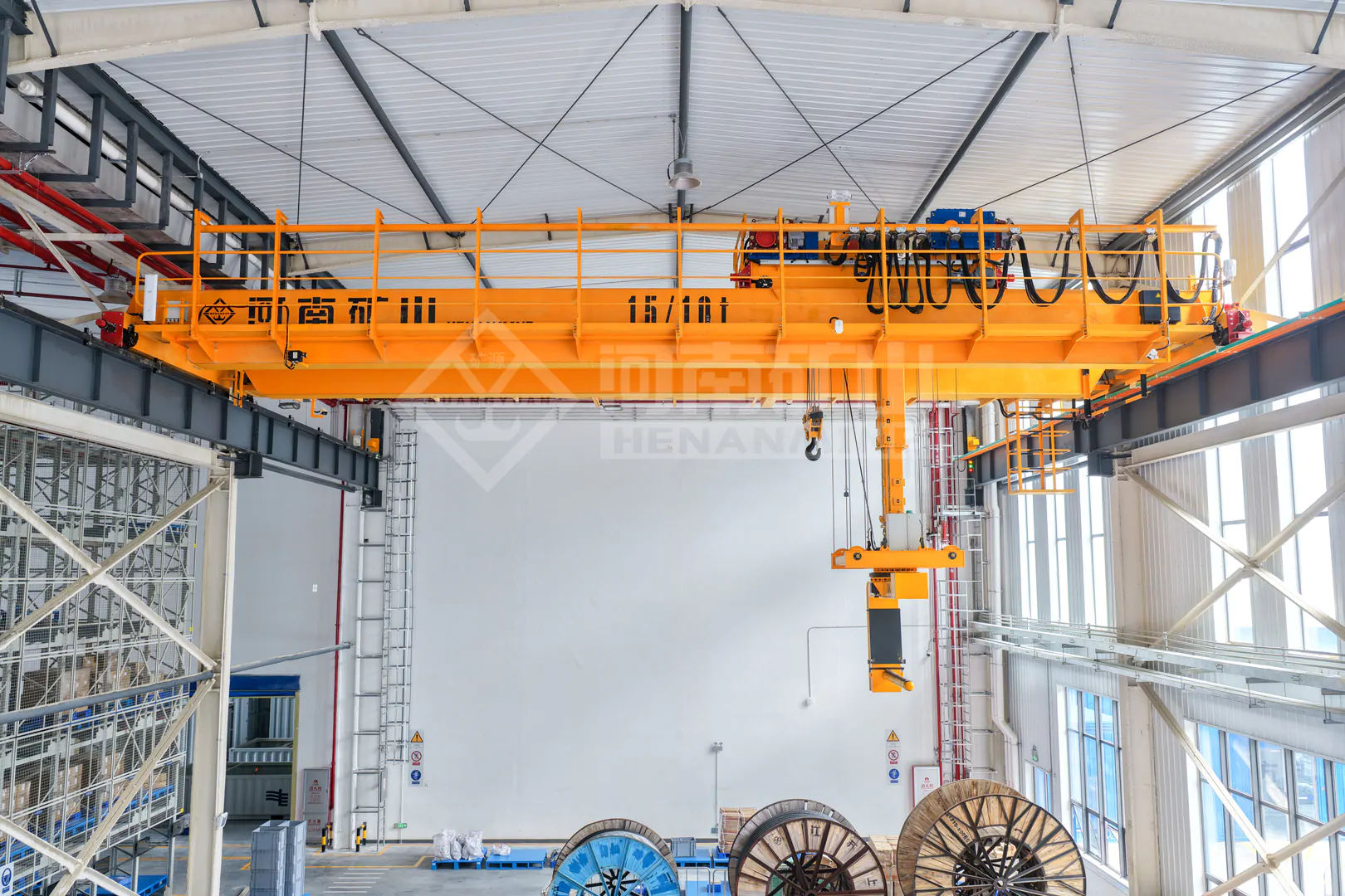 Henan Mine Crane automated overhead crane with a specialized attachment for power-equipment material handling